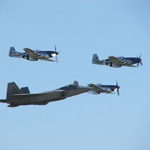 F-22 Raptor and P-51 Mustangs