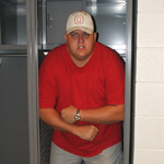 Derek in the visitor's locker room